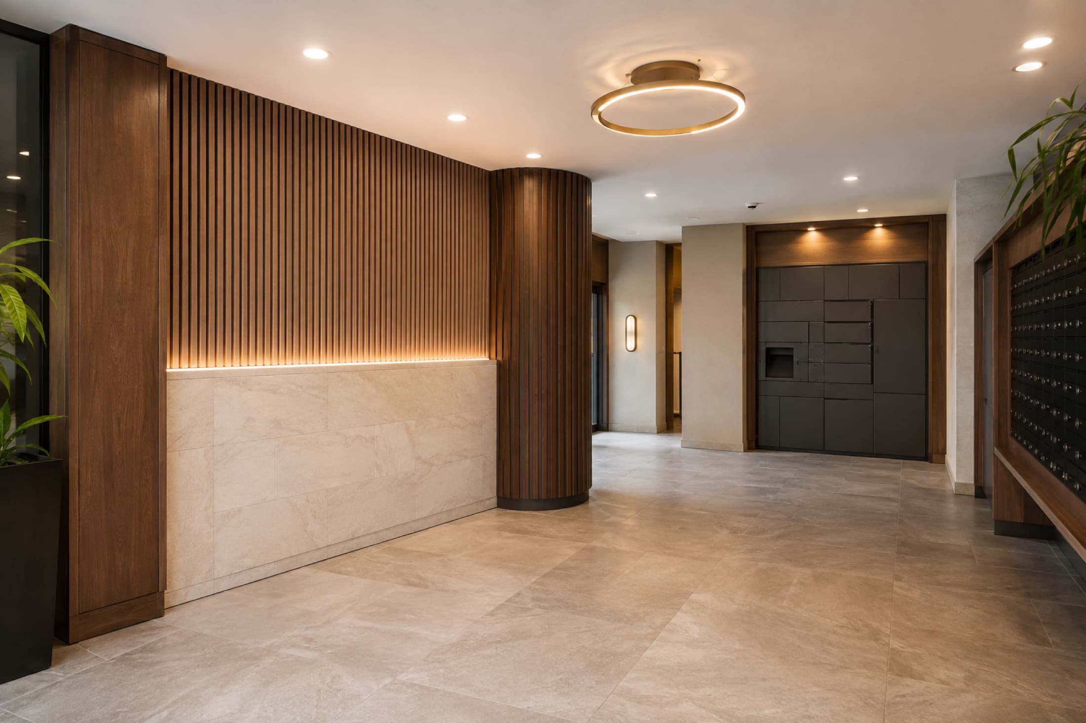 Apartment building lobby with parcel lockers and mailboxes